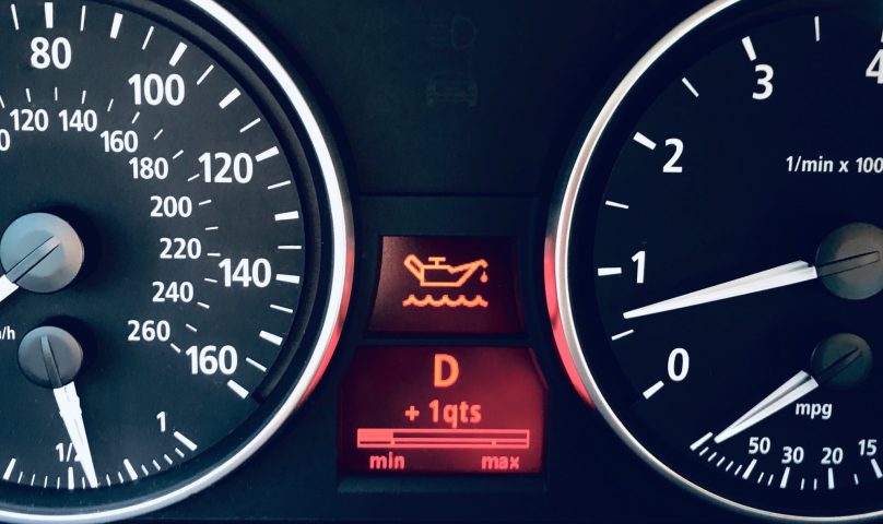 Instrument cluster with engine oil light turning on